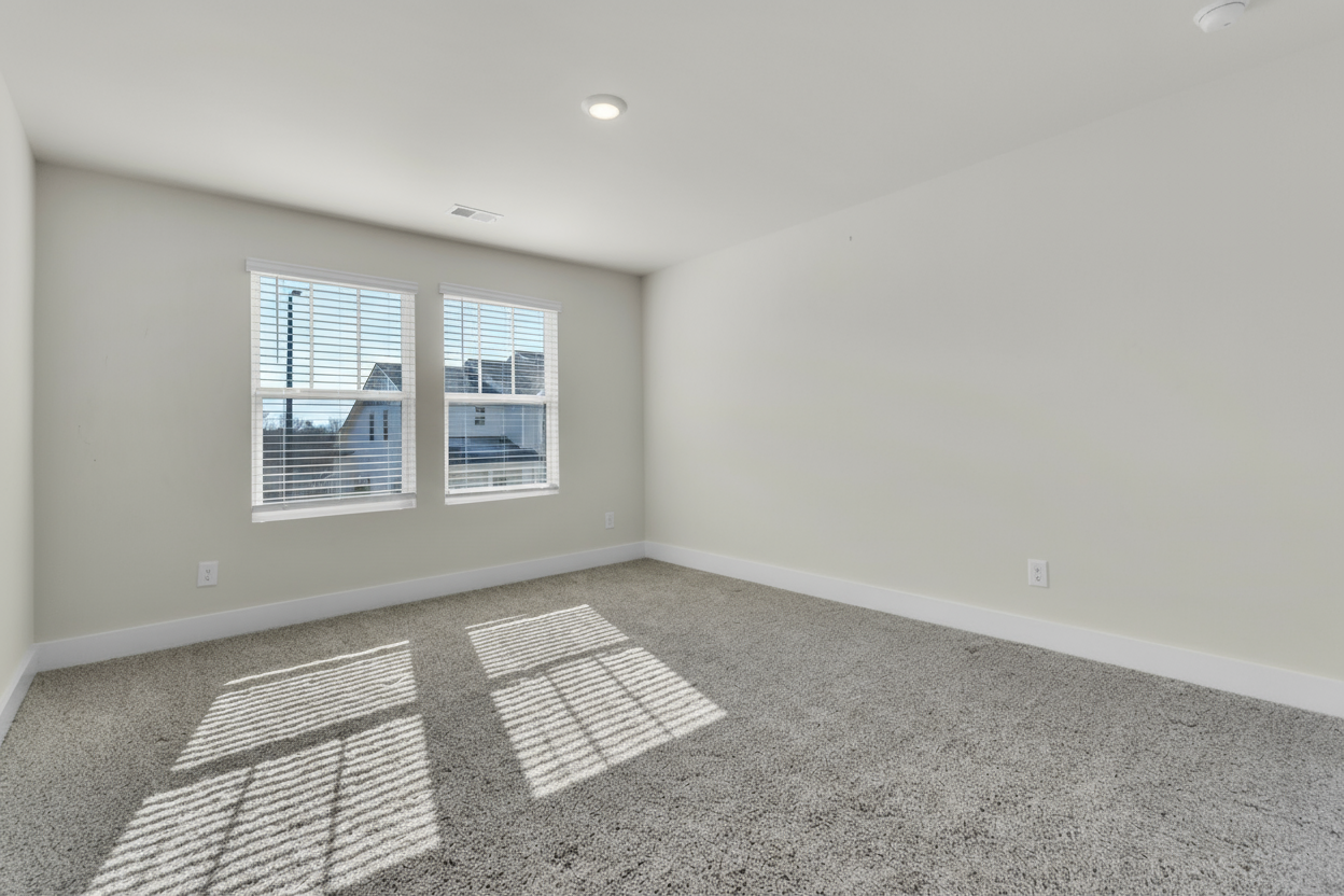 Virtual staging before and after photo - empty bedroom