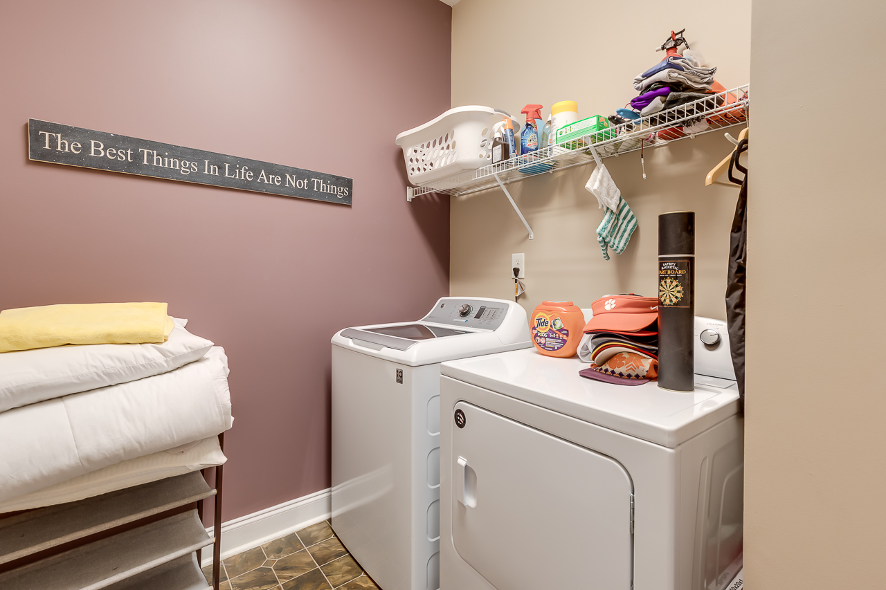 Cluttered laundry room